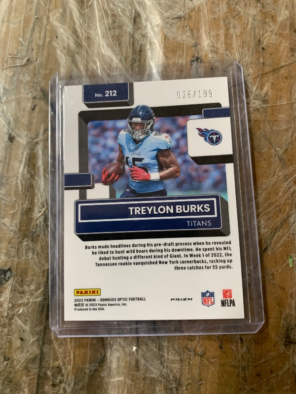 Photo 1 of 2022 Donruss Optic Treylon Burks Red Stars Rated Rookie Holo SSP #212 (Orange)