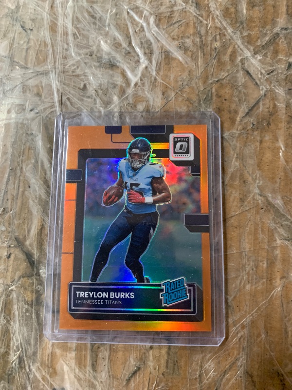 Photo 1 of 2022 Donruss Optic Treylon Burks Red Stars Rated Rookie Holo SSP #212 (Orange)