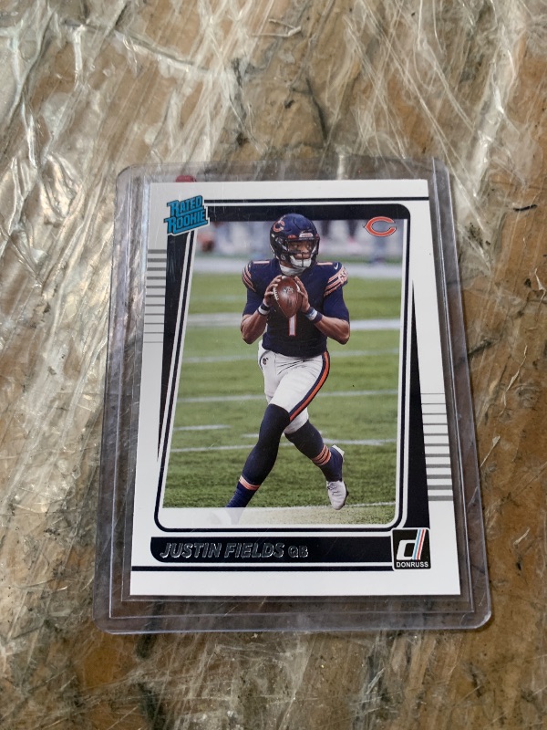 Photo 1 of 2021 Panini Donruss Football Justin Fields Rated Rookie #253 RC Chicago Bears