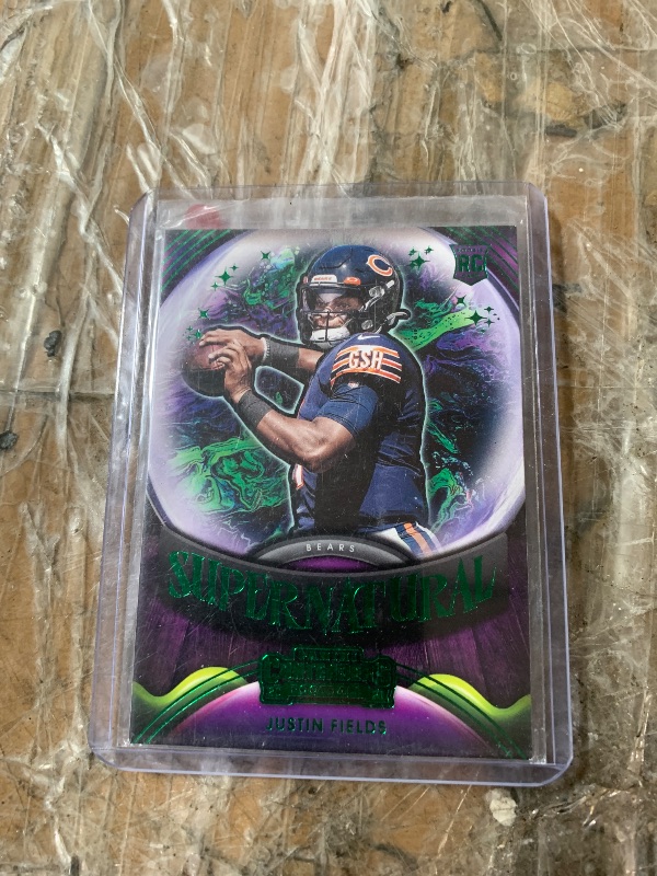 View 1 of Justin Fields [Emerald] #SN-JFI 2021 Panini Contenders Supernatural