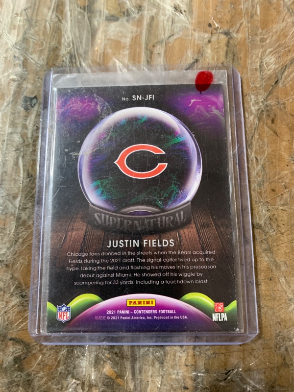 View 2 of Justin Fields [Emerald] #SN-JFI 2021 Panini Contenders Supernatural