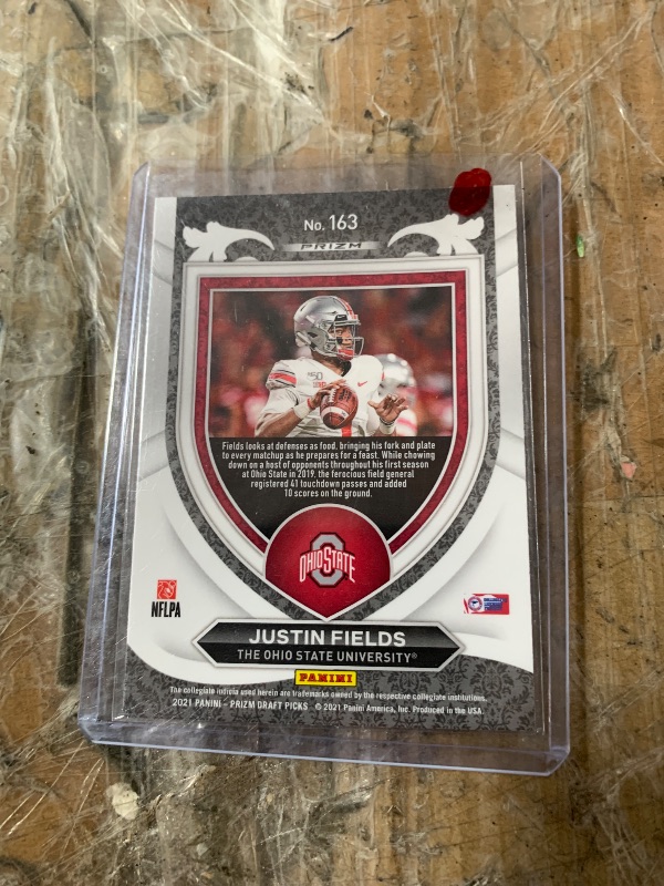 Photo 1 of 2021 Panini Prizm Draft Picks Justin Fields #163 Crusade Red Ice Rookie (RC) Ohio State