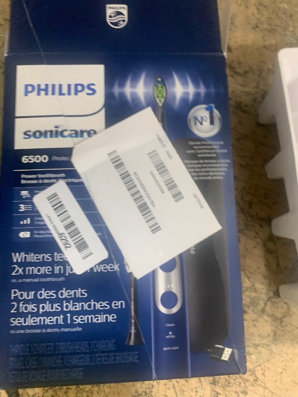 Photo 1 of ***SEE NOTES***Philips Sonicare ProtectiveClean 6500 Rechargeable Electric Toothbrush, with Pressure Sensor, 3 Cleaning Modes, SmarTimer and QuadPacer, 14-Day Battery Life, Charging Travel Case, Navy Blue, HX6462/07
