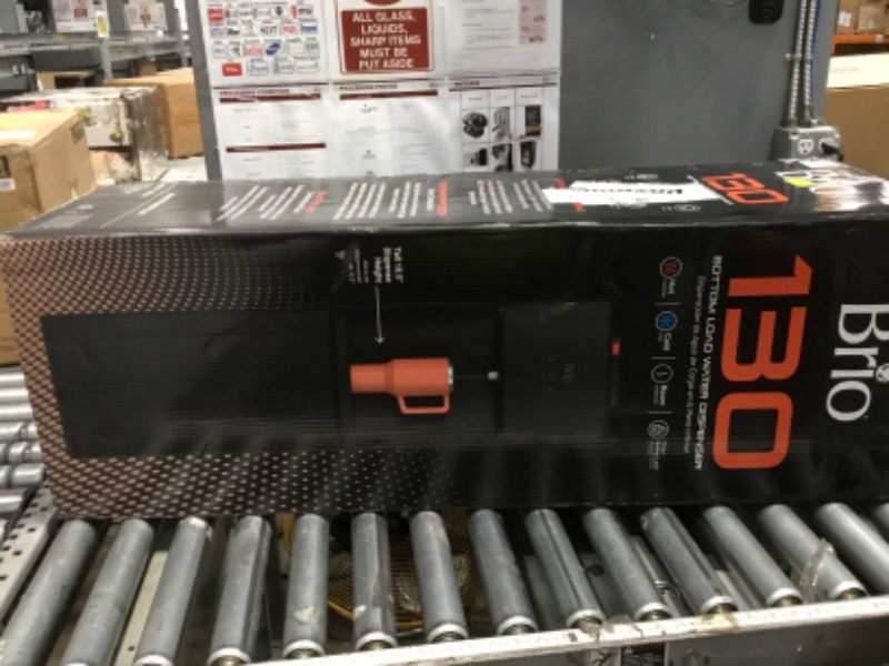 Photo 1 of **HAS SOME DAMAGE** Brio 130 Series Bottom Load Water Cooler Dispenser for 5 Gallon Bottles, Hot, Room & Cold, Great for Home or Office, Child Safety Lock, Empty Bottle Alert, Energy Star 3.0, Black