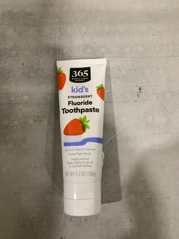 Photo 1 of  Whole Foods Market Kid's Strawberry Fluoride Toothpaste, a 4.2 oz (119g) formula designed for children 2 years of age and older. It is formulated to help protect against cavities and fight tartar build-up while being free from artificial dyes and sodium 