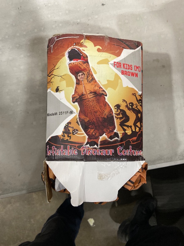 Photo 1 of  Lulu Home Inflatable T-Rex Dinosaur Costume, specifically the brown "Kids (M)" version. The packaging features the "Lulu Home" brand name and model number 2511F-M, which indicates it is sized for children. 