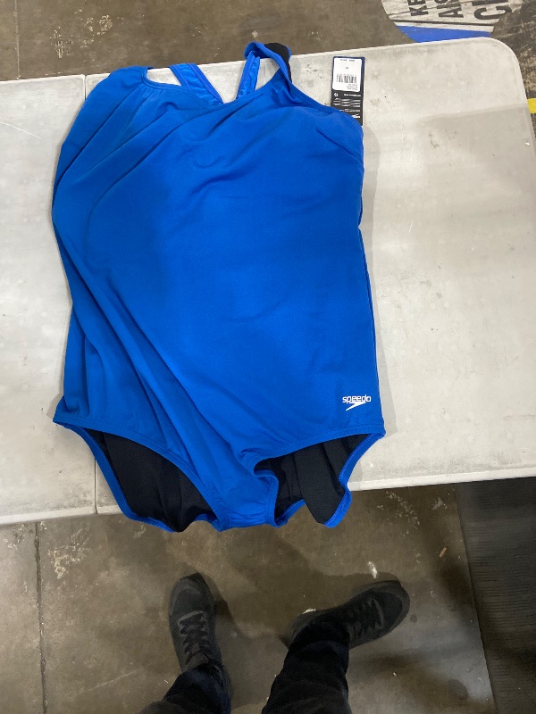 Photo 1 of  Speedo Women's One-Piece Swimsuit in a solid blue color. Specifically, the tags and visual style indicate it is a ProLT Super Pro or an Eco Endurance