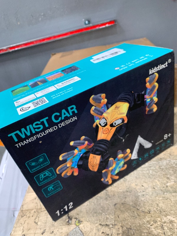 Photo 1 of 1:12 Gesture Sensing RC Stunt Car, 4WD Hand Controlled Remote Control Twist Cars with Light & Music, 360° Rotate Transform Drift, Gifts for 6-8-12 Kids Age 6 7 8 9 10 11 12 Yrs Old?