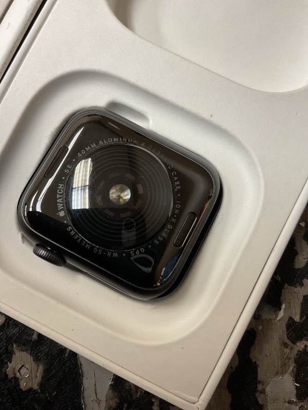 Photo 1 of Apple Watch SE (2nd Gen) [GPS + Cellular 40mm] Smartwatch with Midnight Aluminum Case with Ink Sport Loop One Size. Fitness and Sleep Trackers, Crash Detection, Heart Rate Monitor, Carbon Neutral