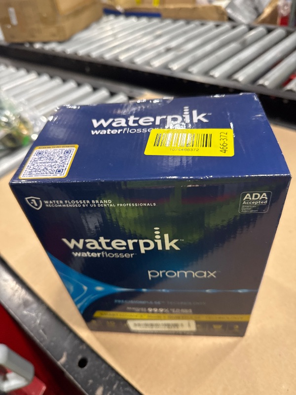 Photo 1 of Waterpik Promax Water Flosser with SmartAdvance Mode for Daily Gum Health and Cleaning Teeth, Braces, Implants, ADA Accepted, Small Quiet Design, Electric Flosser with 10 Settings, 5 Tips, WF-23