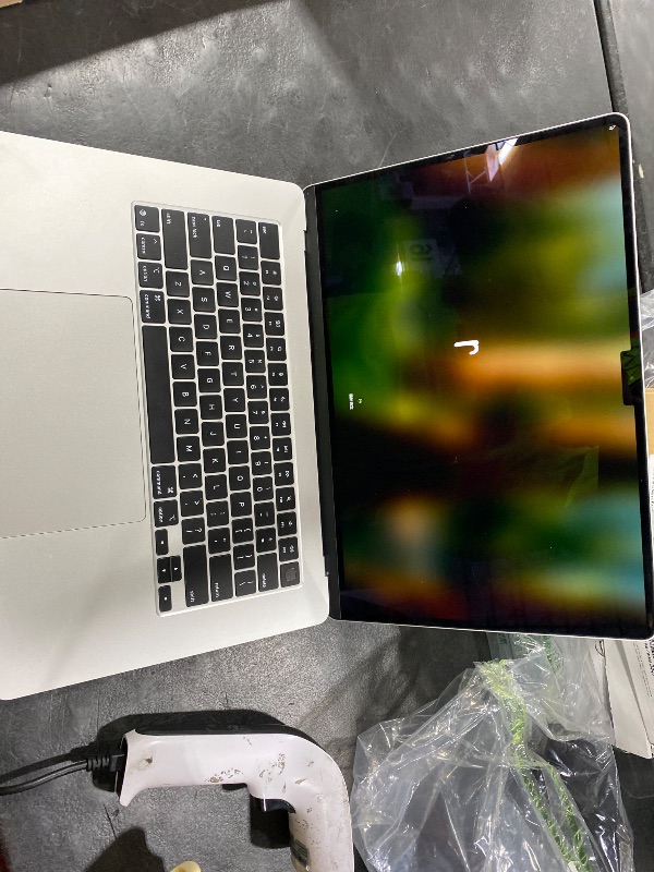Photo 1 of Apple 2025 MacBook Air 15-inch Laptop with M4 chip: Built for Apple Intelligence, 15.3-inch Liquid Retina Display, 16GB Unified Memory, 256GB SSD Storage, 12MP Center Stage Camera, Touch ID; Starlight