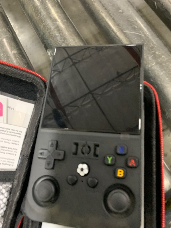Photo 1 of R36MAX Retro Handheld Game Console, 4.0 Inch IPS HD Screen Retro Gaming Console, Handheld Game Console with 18000+ Classic Games, Supports WiFi Networked Fighting and OTG, Built-in 64GB TF Card,Black