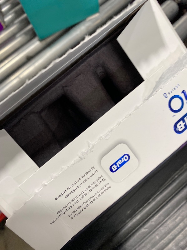 Photo 1 of Oral-B iO Series 8 Electric Toothbrush with 2 Replacement Brush Heads and Travel Case, Rechargeable Toothbrush, Whitealabaster
