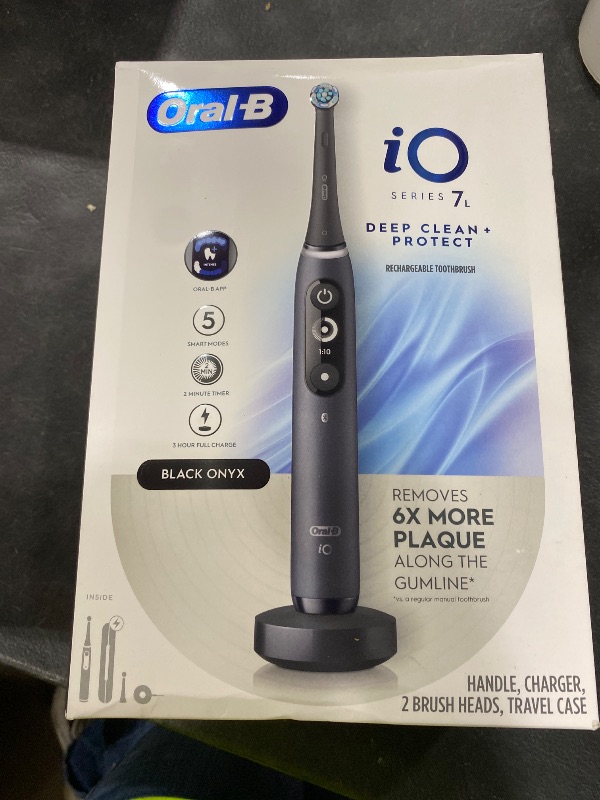 Photo 1 of Oral-B iO Deep Clean + Protect Rechargeable Electric Toothbrush, Black, iO Series 7, 2 Replacement Brush Heads, Charging Travel Case (package may vary)