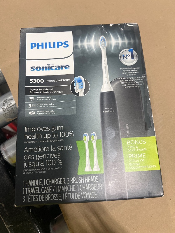 Photo 1 of Philips Sonicare ProtectiveClean 5300 Rechargeable Electric Toothbrush, with Pressure Sensor, 3 Cleaning Modes, SmarTimer and QuadPacer, with 2 Bonus Brush Heads, Travel Case, Black, Model HX6423/34