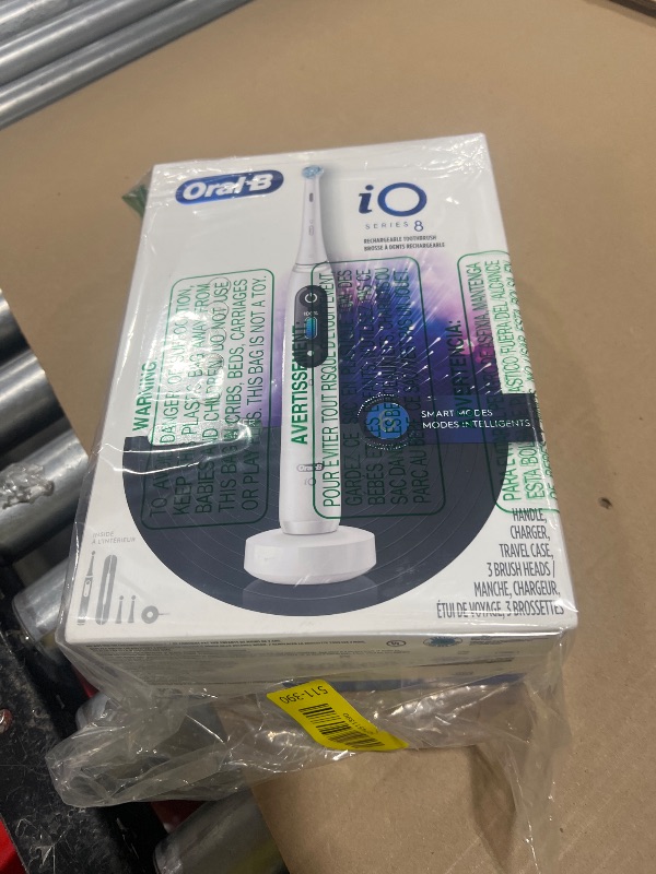 Photo 1 of Oral-B iO Series 8 Electric Toothbrush with 2 Replacement Brush Heads and Travel Case, Rechargeable Toothbrush, Whitealabaster