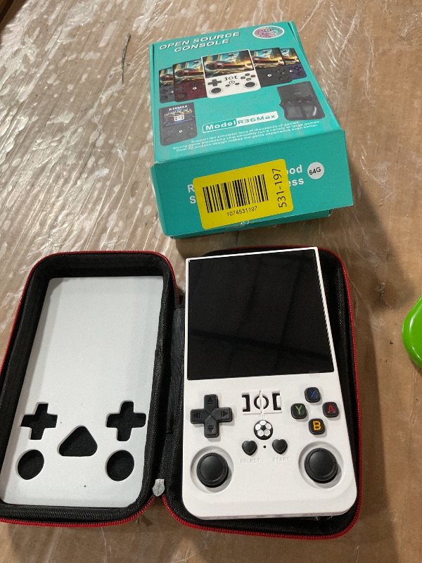 Photo 1 of ?R36MAX 4000mAh Portable Rechargeable Handheld Retro Game Console,Comfort Non-Slip Handheld Standing Retro Game Console with 64G TF Car,4.0-inch Screen,for Office,White