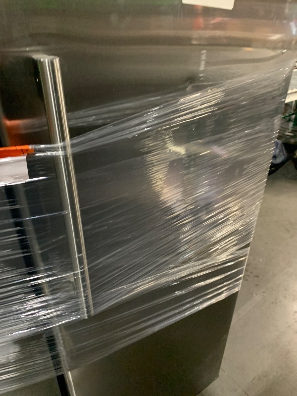 Photo 1 of ***DAMAGED - SEE NOTES/PICTURES***
24 in. 11 cu. ft. Convertible Auto Defrost Garage Ready Upright Freezer/Refrigerator in Stainless Steel, Energy Star
