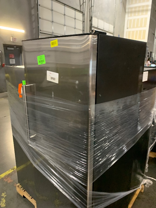 Photo 1 of ***DAMAGED - SEE NOTES/PICTURES***
24 in. 11 cu. ft. Convertible Auto Defrost Garage Ready Upright Freezer/Refrigerator in Stainless Steel, Energy Star
