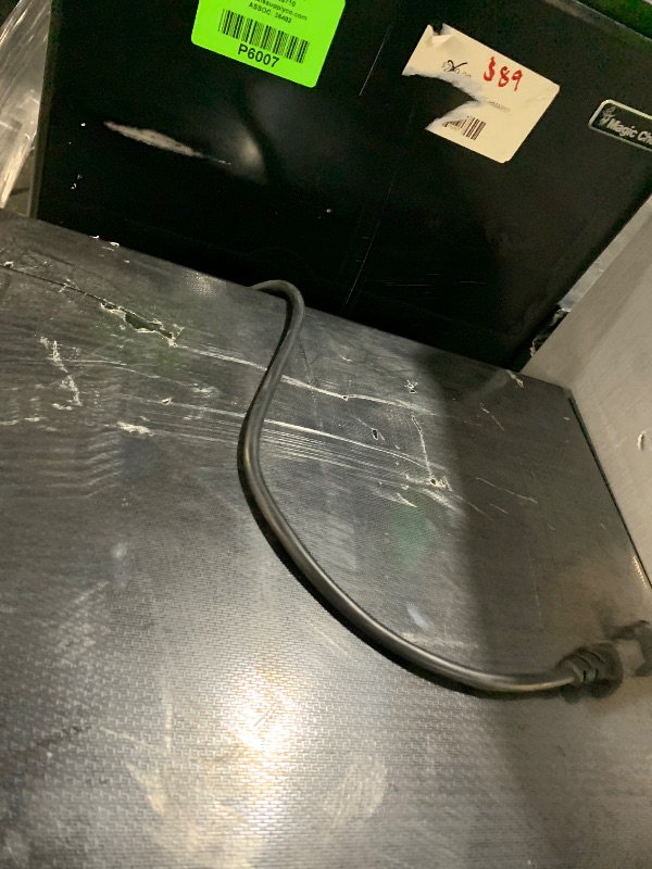 Photo 1 of ***DAMAGED - SEE NOTES/PICTURES***
4.5 cu. ft. Mini Refrigerator in Stainless Look with Glass Shelves, Top Freezer, and Energy Efficiency
