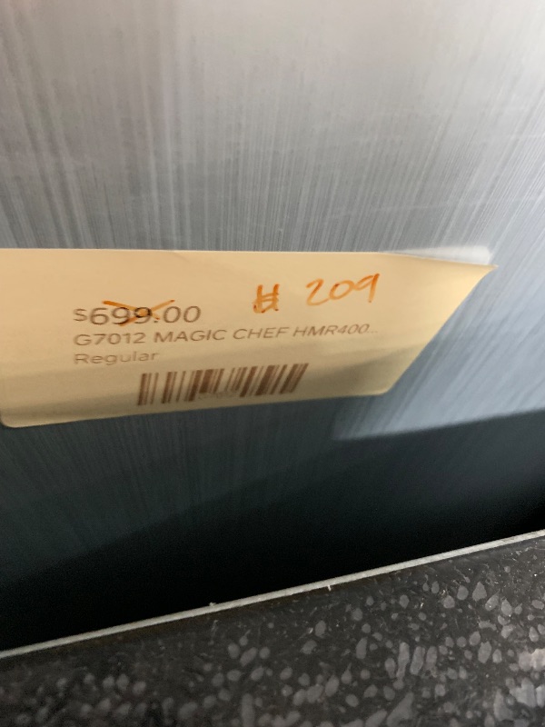 Photo 1 of ***DAMAGED - SEE NOTES/PICTURES***
Magic Chef 4.4 Cu. Ft. Compact Refrigerator, Silver