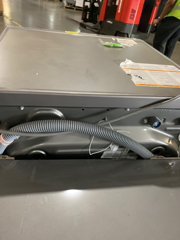 Photo 1 of ***DAMAGED - SEE NOTES/PICTURES***
24 Inch Smart Front Load Washer/Dryer Combo with 2.4 cu.ft. Capacity, 14 Wash Programs, 13 Wash Options, 8 Dry Cycles, TurboWash™, Allergiene™ Cycle, Sanitize Cycle, Steam Refresh, Load Sensing and Delay Start: Graphite 