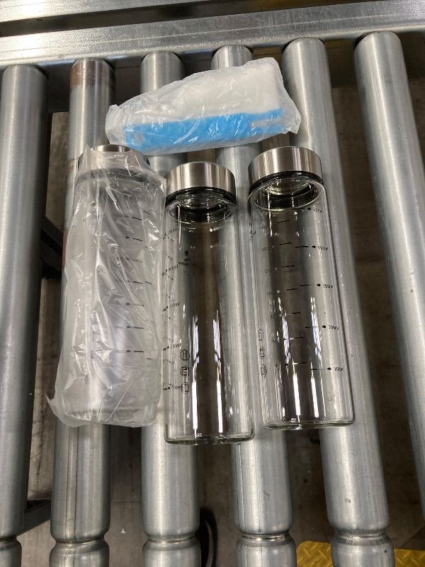 Photo 1 of ***3 PACK -MISSING ONE -SELLING AS IS *** Olivego 20oz Juice Bottles - 3 Pack Wide Mouth Glass Bottles with Lids- BPA Free, Stainless Steel Lids for Juicing, Smoothies, Infused Water, Beverage Storage - Leakproof, Borosilicate, Clear