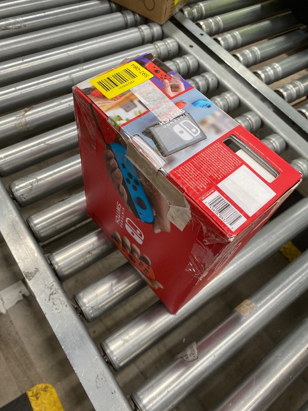 View 4 of ****** just the charger****** Nintendo Switch with Neon Blue and Neon Red Joy-Con - Handheld Gaming Console