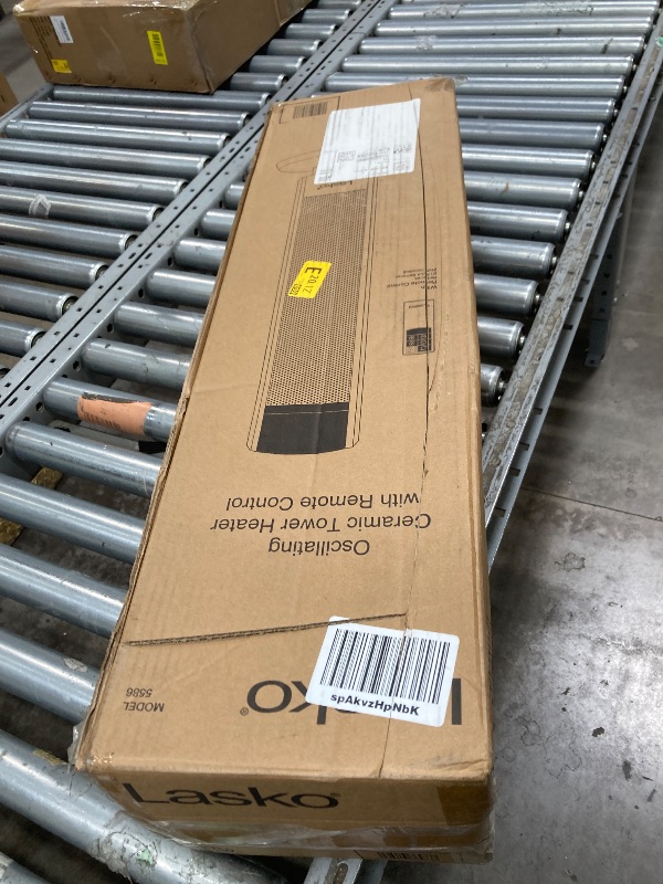 Photo 1 of ***It is used; it is unknown whether any parts are missing, and it is unknown whether it functions 100%****Lasko Oscillating Digital Ceramic Tower Heater for Large Rooms, with Adjustable Thermostat, Timer and Remote Control, 29 Inches, 1500W, Black, 5586