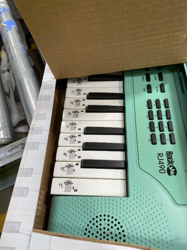 Photo 1 of **PARTS ONLY***RockJam 49 Key Keyboard Piano, Portable Electronic Music Keyboard with Speakers, USB-C Power or Battery Operation, Headphone Input, 200 Tones, 200 Rhythms, Note Stickers & Lessons