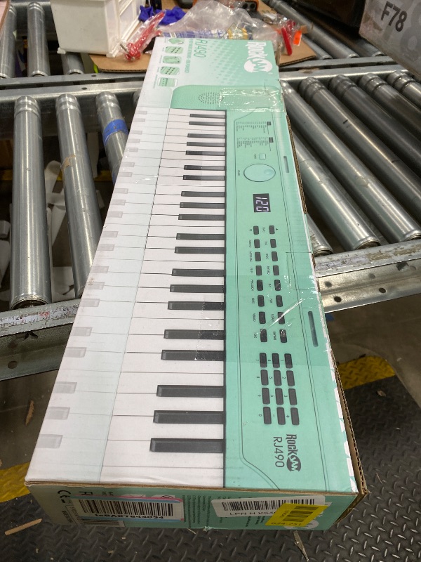 Photo 1 of **PARTS ONLY***RockJam 49 Key Keyboard Piano, Portable Electronic Music Keyboard with Speakers, USB-C Power or Battery Operation, Headphone Input, 200 Tones, 200 Rhythms, Note Stickers & Lessons
