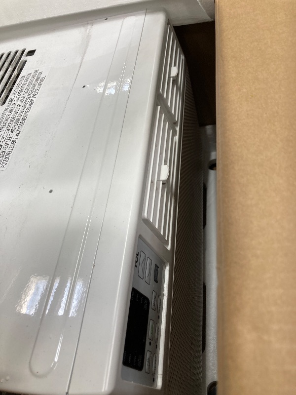 Photo 1 of ***DAMAGED-NON-FUNCTIONAL SELLING AS PARTS ONLY*** GE Window Air Conditioner 10,000 BTU for Rooms up to 450 sq ft., Wi-Fi Enabled, Energy-Efficient Cooling for Medium Rooms, Easy Install Kit, Control Using Remote or Smartphone App, White