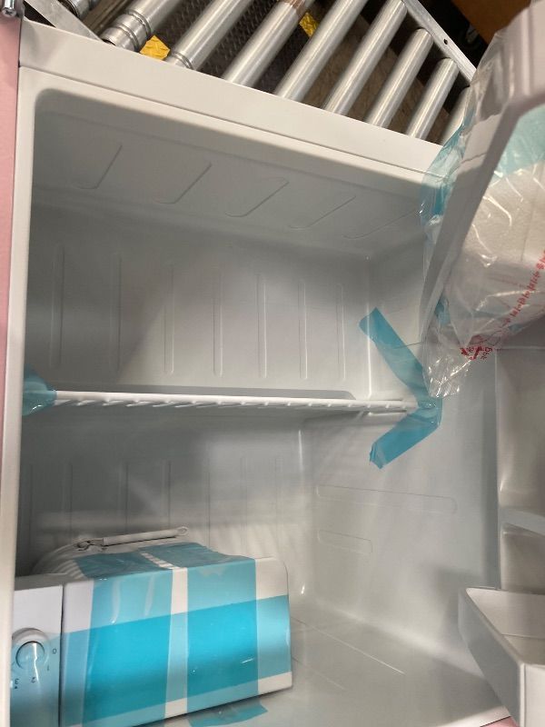 Photo 1 of **DAMAGED DOOR HANDLE AND HINGES***Frigidaire EFR176 1.6 cu. ft. Retro Bar Fridge with Side Bottle Opener (Pink)
