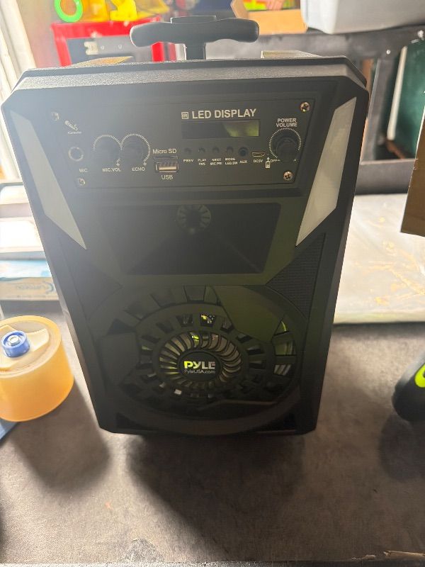 Photo 1 of **UNTESTED**
Pyle Portable Bluetooth PA Speaker - 300 W 8” Rechargeable Outdoor BT Karaoke Audio System - Multi-Color Party Lights, LED Display, FM/AUX/MP3/USB/SD, 6.5mm in - Wired Microphone, Remote Control