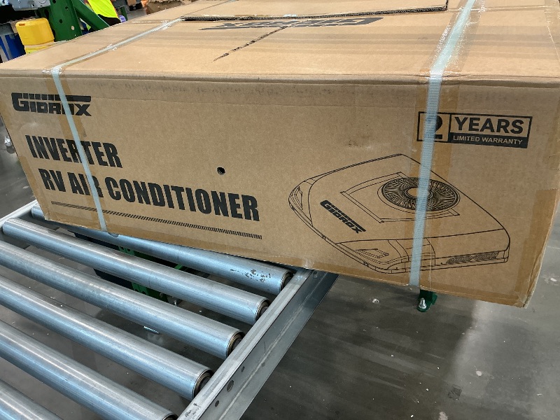 Photo 1 of ***** AS IS ALL SALES FINAL NO RETURNS ******L 10000 BTU 12V DC RV Air Conditioner with Heater - Battery Powered, Low Power Consumption, Ultra Quiet & Fast Cooling Rooftop AC Unit with APP Remote for Camper Van and Truck
