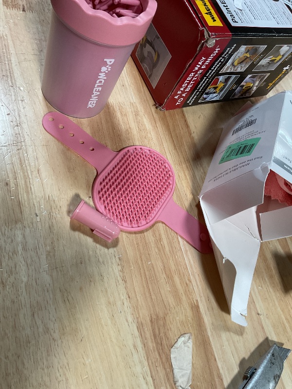 Photo 1 of **missing bigger brush**Professional 7 in 1 Dog Paw Cleaner for Dogs - Includes 1 Portable Paw Washer, 1 Bath Brush, 2 Dog Toothbrushes and 3 Absorbent Towels Note: Fits Paws 1.5 to 2.5 Inches Wide (Medium, Light Pink)