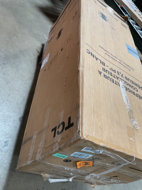Photo 1 of ** scrape damage/dirt ** TCL 7.3 Cu Ft Double Door Refrigerator with Freezer in White, Energy Efficient Fridge for Dorm, Apartment, Kitchen, Garage & Office