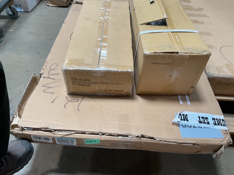 Photo 1 of **3 boxes**rectangle computer desk, 66 x 30“