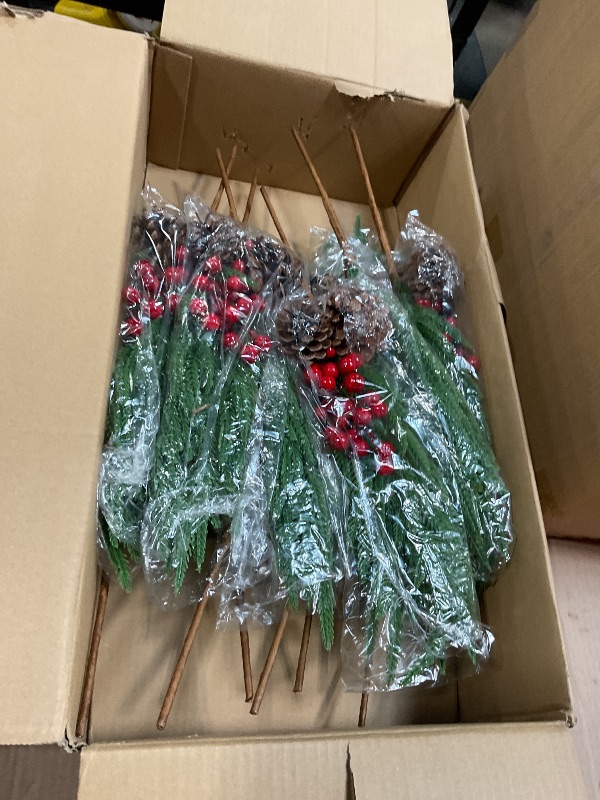 Photo 1 of 12 Pcs Artificial Norfolk Pine Stems, 17.7 Inches Realistic Touch Norfolk Branch with 24 Big Pinecones and 24 Red Berry Picks Christmas Faux Greenery Faux Sprigs for Xmas Indoor Outdoor Home Décor