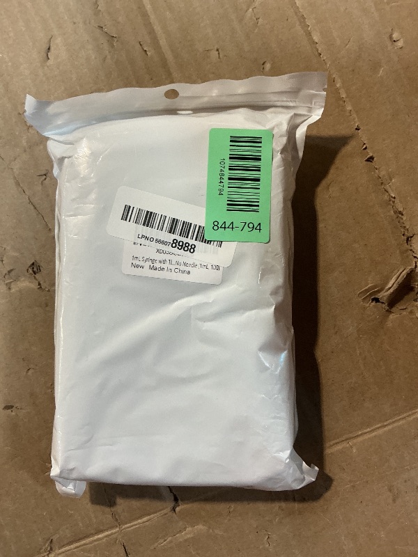 Photo 1 of 100 Pack 1ml Syringe with Cap for Liquid, 1cc Plastic Small Syringes with Cover, Non-Sterile, No Needle