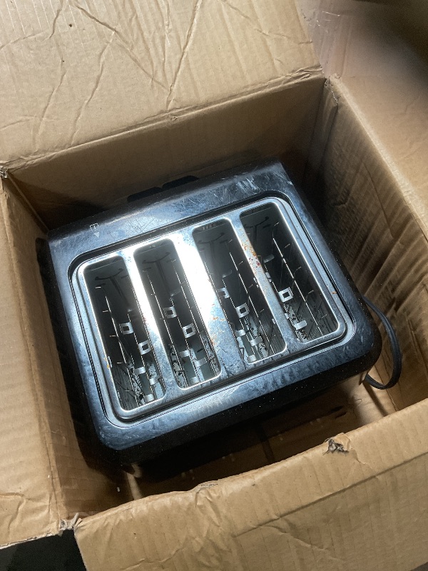 Photo 1 of ** EEDS CLEANING OR GOOD FOR PARTS**Cuisinart 4-Slice Compact Plastic Toaster, Black, CPT-142BKP1