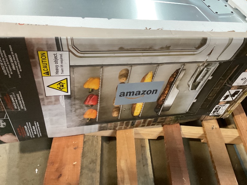 Photo 1 of ***DAMAGED BACK PANEL*** Masterbuilt® 40-inch Digital Electric Vertical BBQ Smoker with Leg Kit, Side Wood Chip Loader and 970 Cooking Square Inches in Black, Model MB20070122