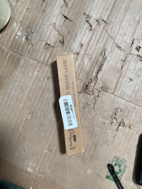Photo 1 of "SAINT GERMAIN Premium Hand Crafted Bread Lame for Dough Scoring Knife, Lame Bread Tool for Sourdough Bread Slashing with 10 Blades Included with Replacement with Authentic Leather Protector Cover"