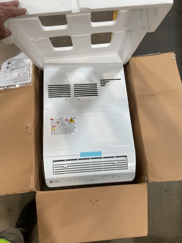 Photo 1 of ***RECOMENDED FOR PARTS/ DOESN'T BLOW COLD AIR / AIR STAYS HOT**** GE Profile ClearView Inverter Window Air Conditioner Unit, 12,200 BTU, Energy Efficient Cooling up to 550 sq ft., Ultra Quiet, SMART Home Capable, Includes Remote, White