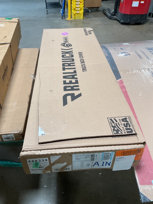 View 2 of ***RECOMENDED FOR PARTS ONLY/ MISSING ASSEMBLY RAILS*** RealTruck BAK BAKFlip MX4 Hard Folding Truck Bed Tonneau Cover | 448339 | Fits 2021-2026 Ford F-150 (incl. Raptor/Lightning) 5' 7" Bed (67.1")