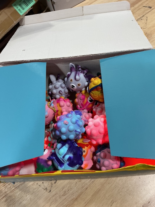 Photo 1 of ***MISSING HALF*** 48 Pack Light Up Party Favors for Birthday, Glow in The Dark Party Supplies, Pop Fidget Toys Bulk 3D Stress Ball Toy, Squeeze Toys, Easter Filler, Classroom Prizes Stocking Stuffers for Adults Toddler