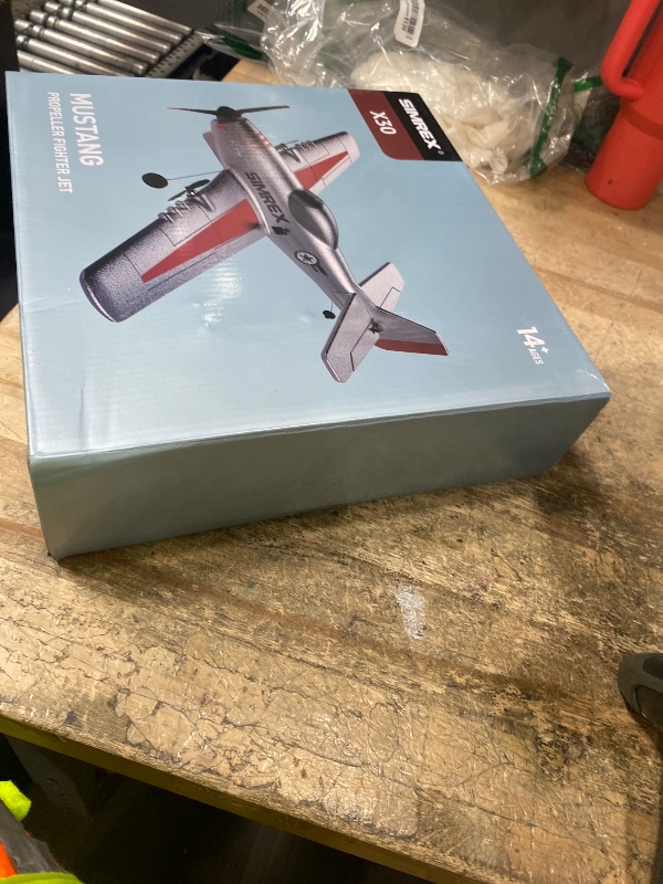 Photo 1 of **MISSING CHARGER**SIMREX RC Plane for Kids & Beginners - P51 Foam Glider, 2.4GHz 3-Channel Remote Control Airplane Toy with 6-Axis Gyro, Easy to Fly RC Airplane for Outdoor Park Play - Gift for Boys & Girls