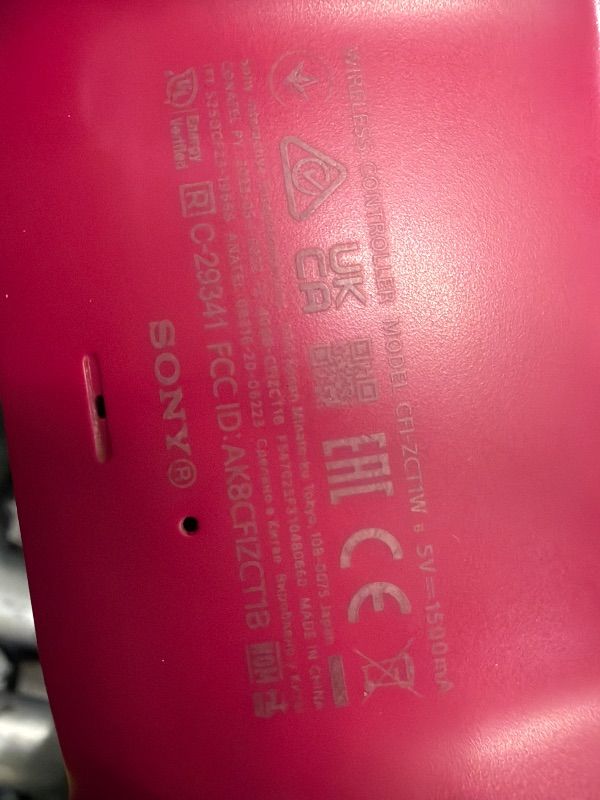 Photo 1 of (UNTESTED) PlayStation DualSense™ Wireless Controller – Cosmic Red - for PS5, PC, MAC & Mobile