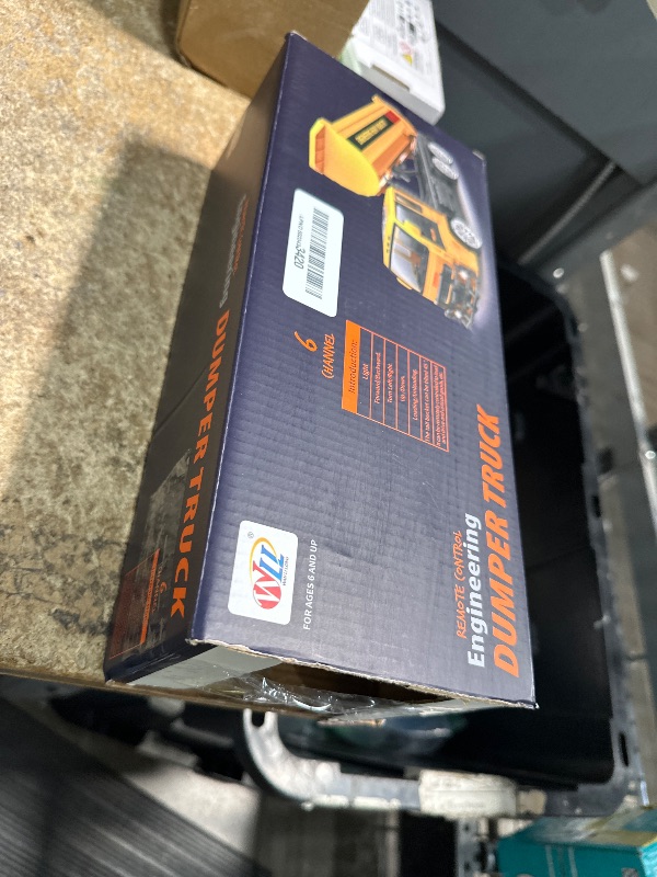 Photo 1 of **MISSING REMOTE AND BATTERIES**Jiakora Remote Control Dump Truck for Kids, 2.4GHz RC Construction Vehicle with LED Lights, 45° Dumping Function, 2 Rechargeable Batteries, Toy Truck for Boys Girls 3 4 5 6 7 8 Years Old