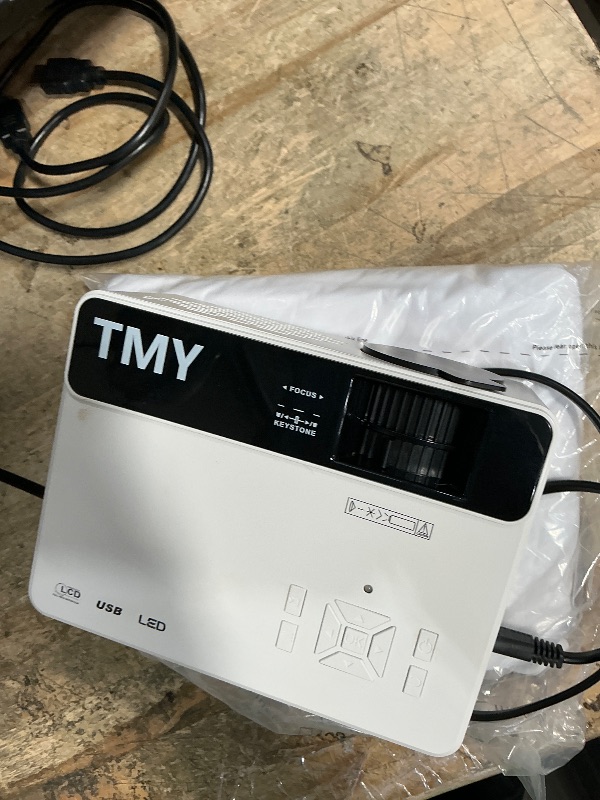 Photo 1 of ****PARTS ONLY ****** *TMY 1080P Full HD Portable Mini Projector, Bluetooth Movie Projector, Compatible with TV Stick/Smartphone/PC/Game Console/HDMI/USB, Indoor & Outdoor Use, with Projector Screen **DID NOT TURN ON